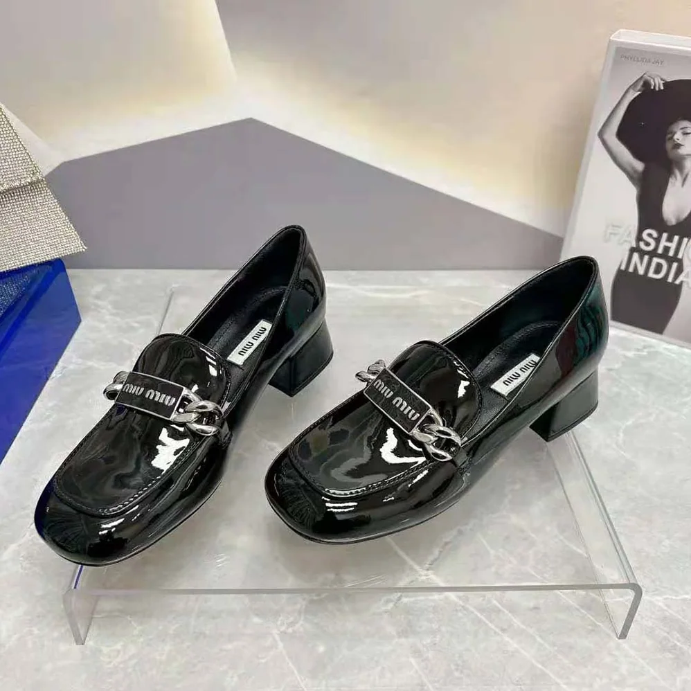 Miu Miu Patent Leather Loafers in 35 mm Heel Height for Women in Black