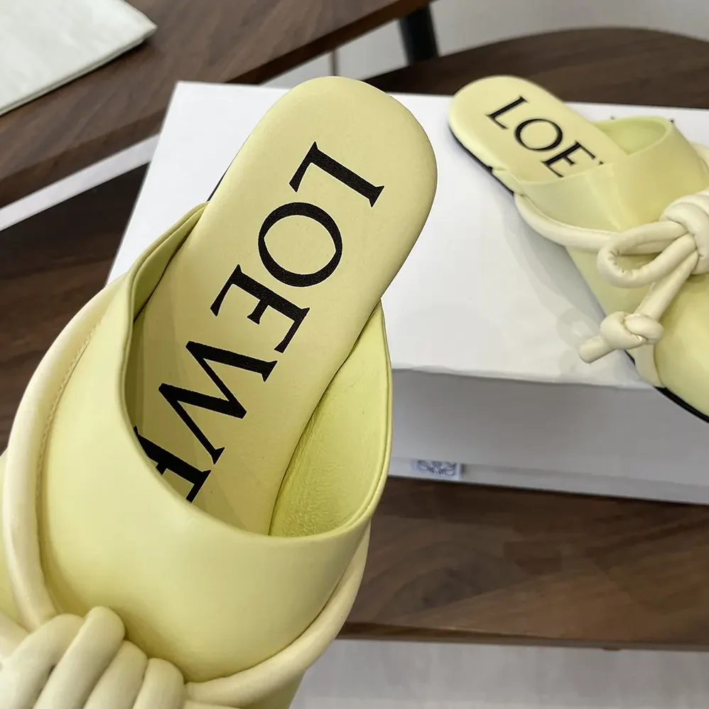 Loewe Flamenco Knot Mule in Lambskin for Women in Yellow Loewe Flamenco Knot Mule in Lambskin for Women in Yellow