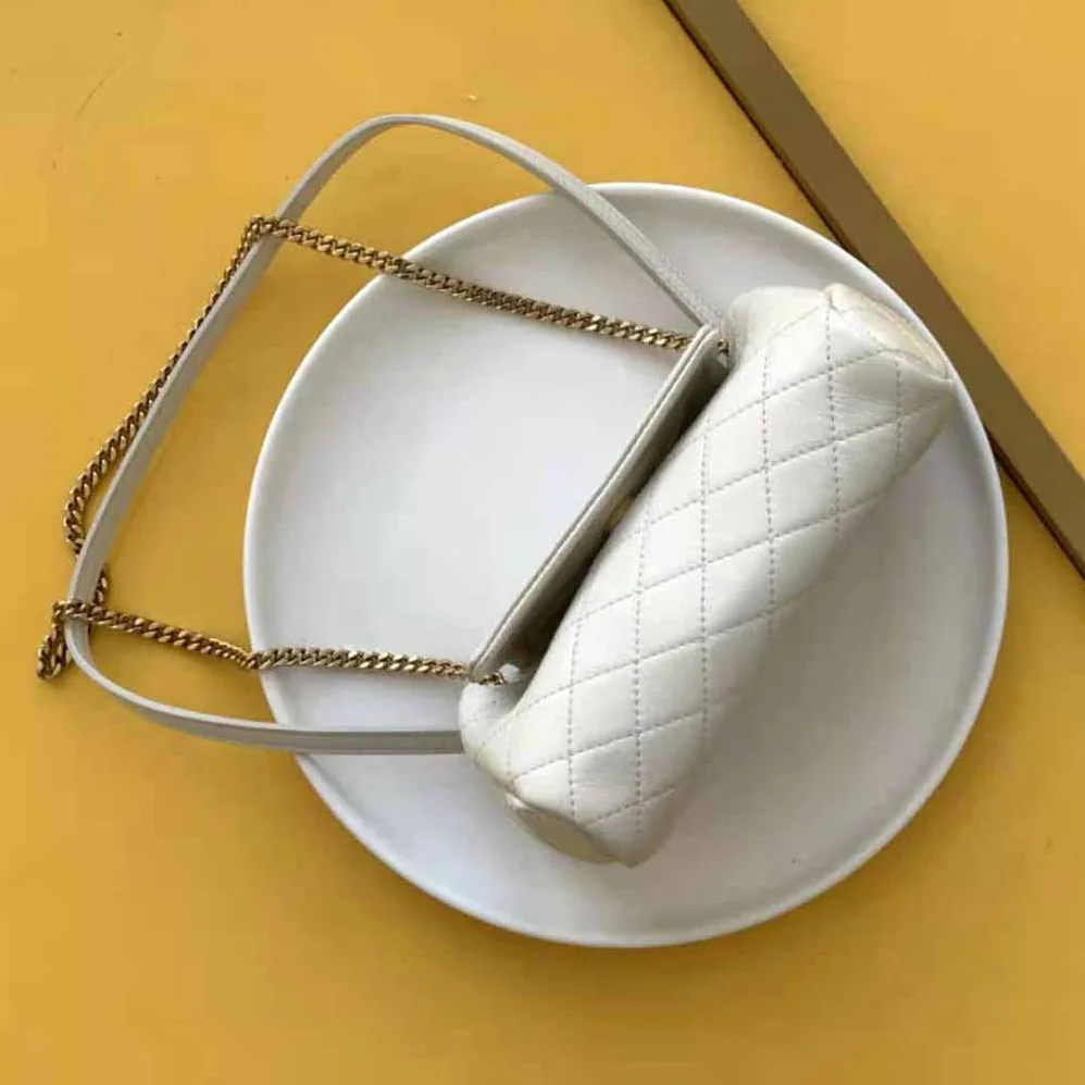 Saint Laurent YSL Mini Nolita in Lambskin for Women in White Saint Laurent YSL Mini Nolita in Lambskin for Women in White