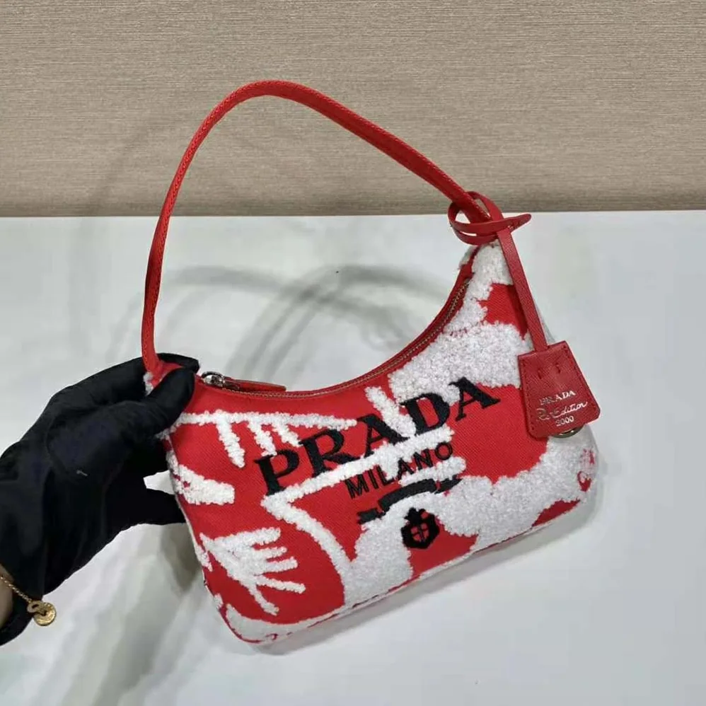 Prada Re-Edition 2006 Embroidered Drill Mini Bag for Women in Red Prada Re-Edition 2006 Embroidered Drill Mini Bag for Women in Red