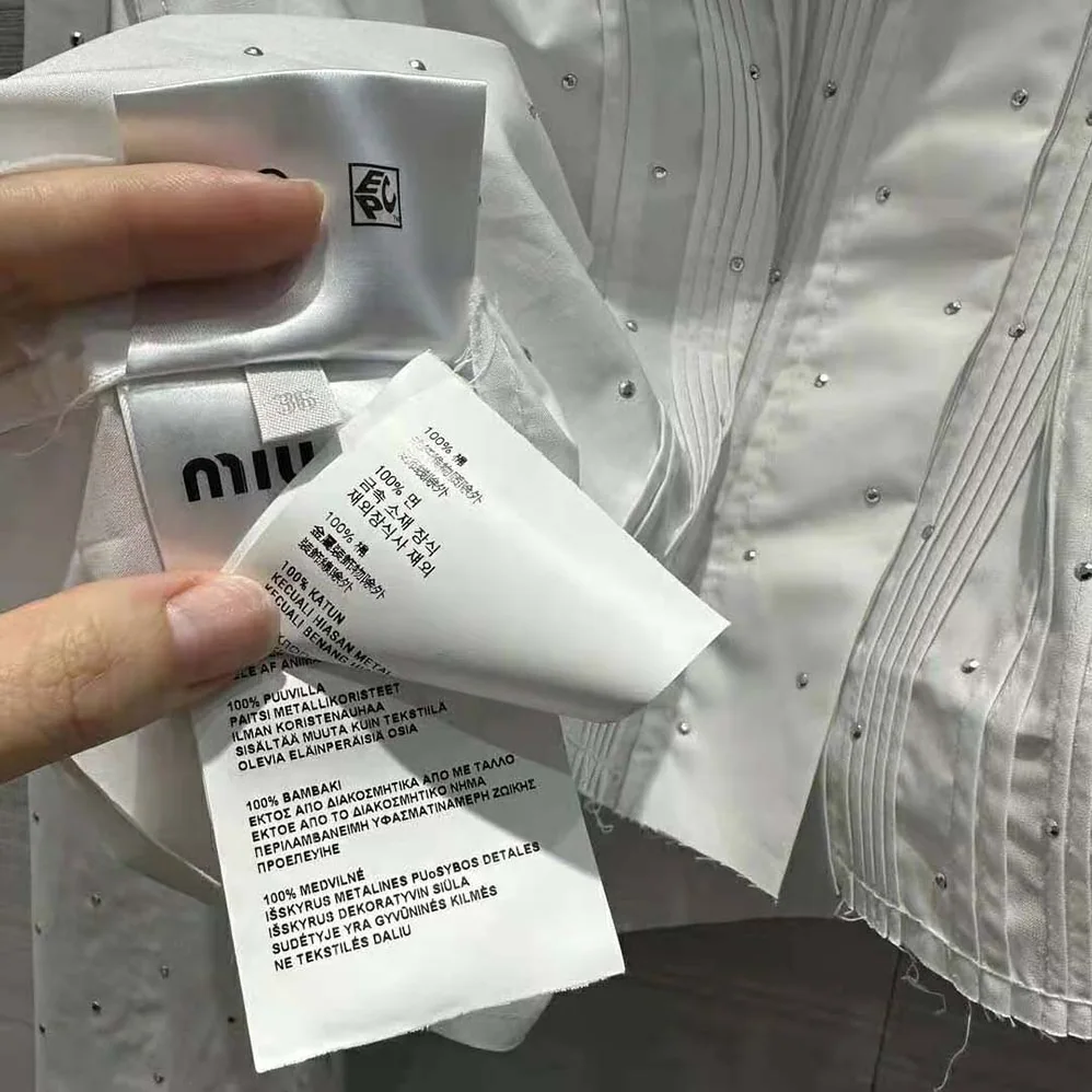 Miu Miu Poplin Shirt with Embroidered Logo for Women in White Miu Miu Poplin Shirt with Embroidered Logo for Women in White