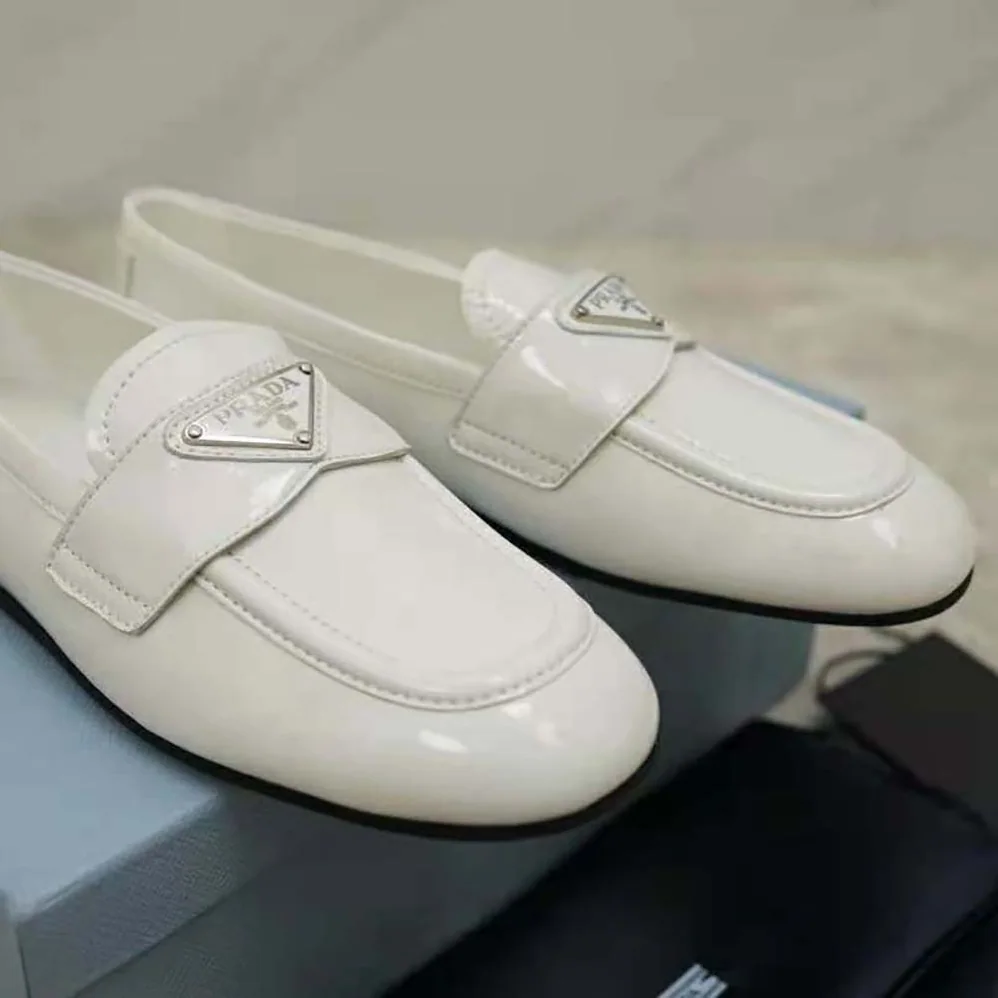Prada Patent Leather Loafers in 5mm Heel for Women in White Prada Patent Leather Loafers in 5mm Heel for Women in White