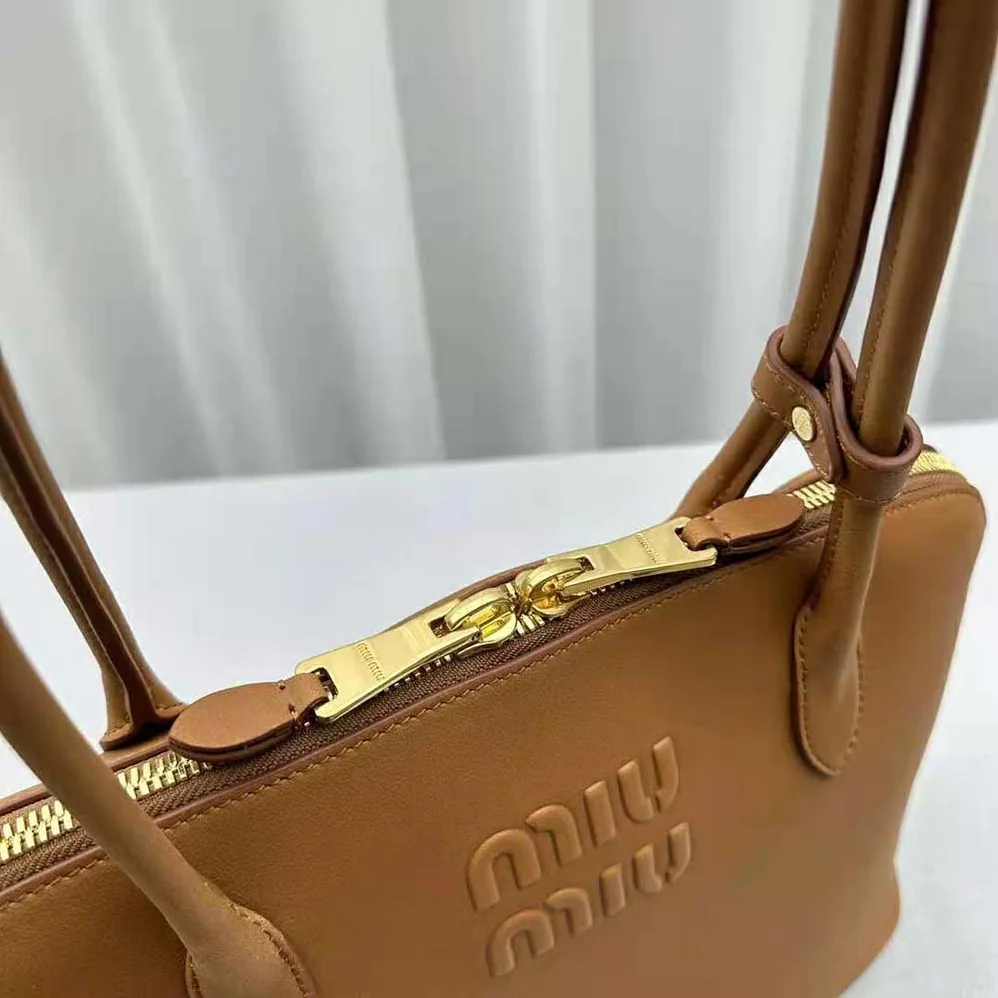 Miu Miu Leather Bag with Embossed Lettering Logo for Women in Brown Miu Miu Leather Bag with Embossed Lettering Logo for Women in Brown