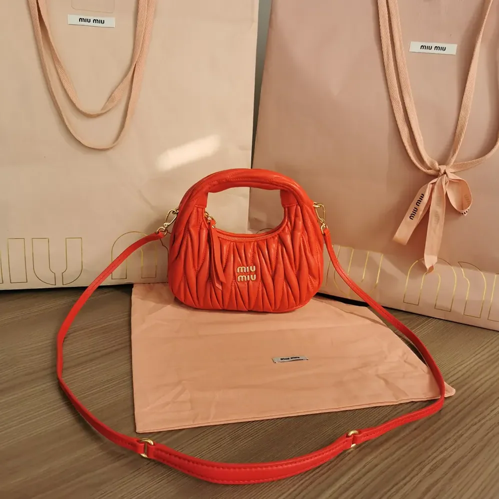 Miu Miu Wander Matelassé Nappa Leather Hobo Mini-Bag for Women in Red Miu Miu Wander Matelassé Nappa Leather Hobo Mini-Bag for Women in Red