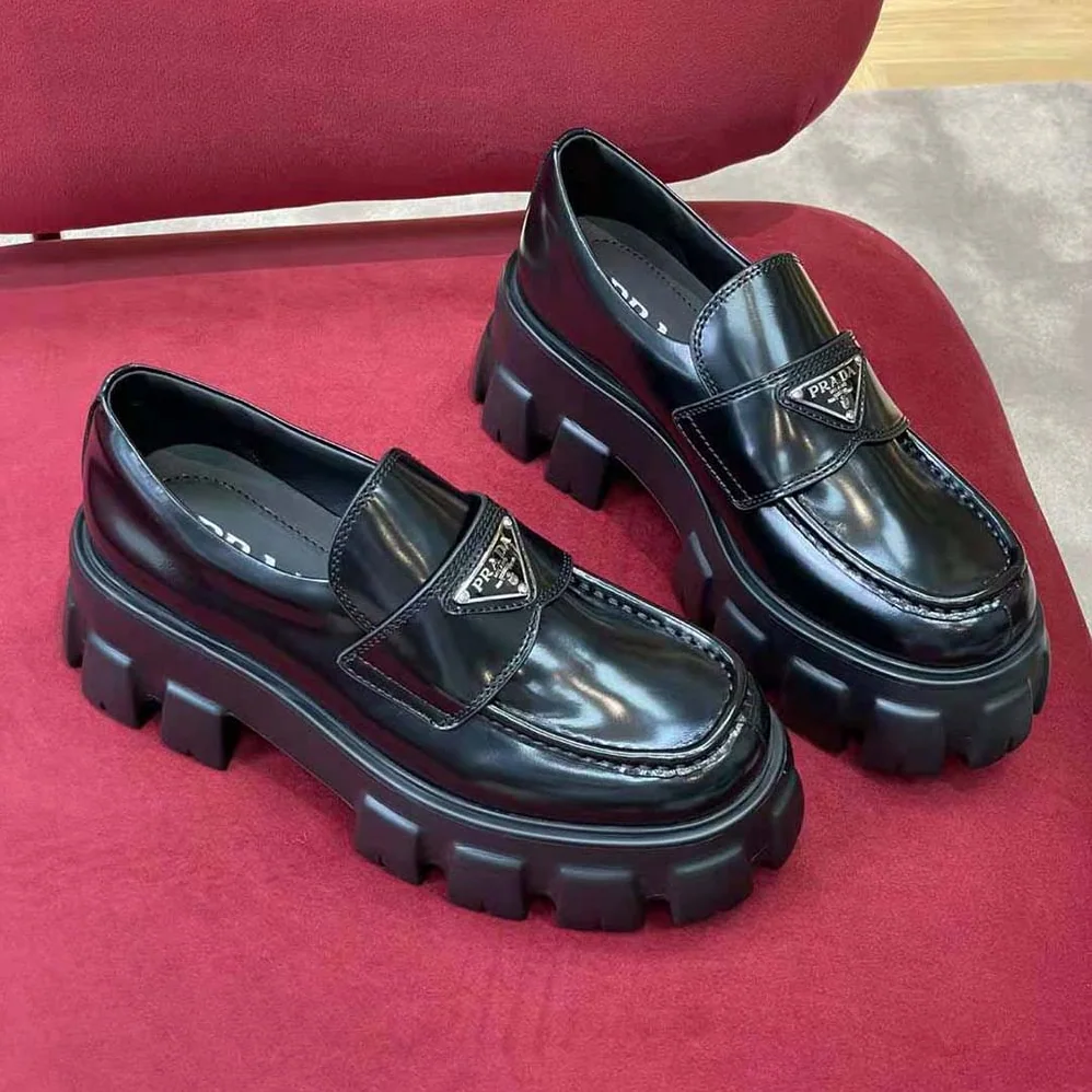 Prada Brushed Leather Monolith Loafers for Unisex in Black