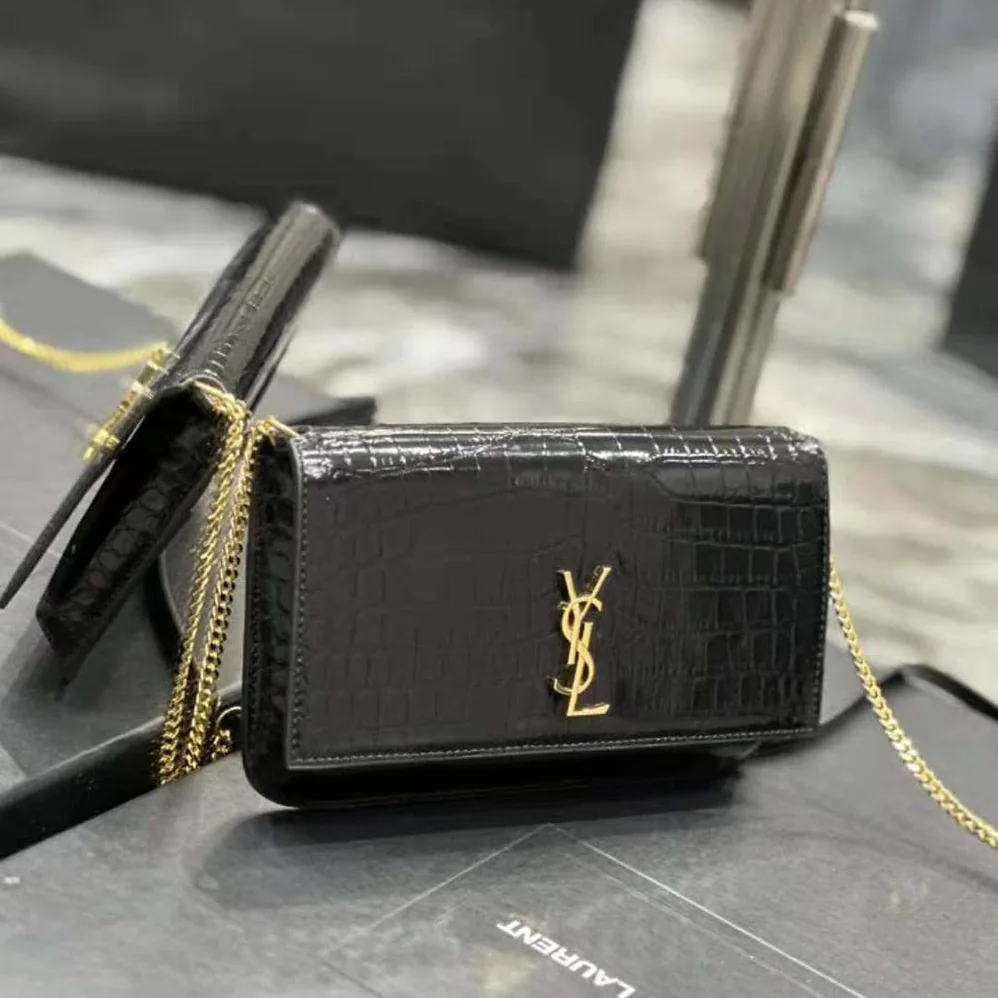 Saint Laurent YSL Cassandre Phone Holder with Strap in Shiny Crocodile-Embossed Leather for Women in Black Saint Laurent YSL Cassandre Phone Holder with Strap in Shiny Crocodile-Embossed Leather for Women in Black