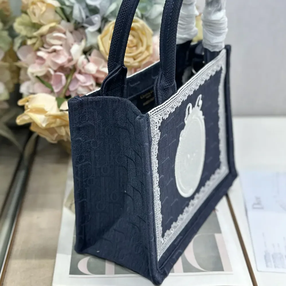 Dior Small Dior Book Tote with Strap Blue Dior Oblique Embroidery with White Lace and Dior Médaillon for Women Dior Small Dior Book Tote with Strap Blue Dior Oblique Embroidery with White Lace and Dior Médaillon for Women