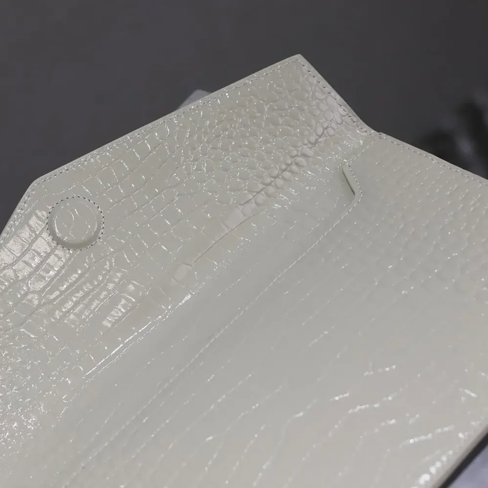 Saint Laurent YSL Uptown Pouch in Crocodile-embossed Shiny Leather for Women in White