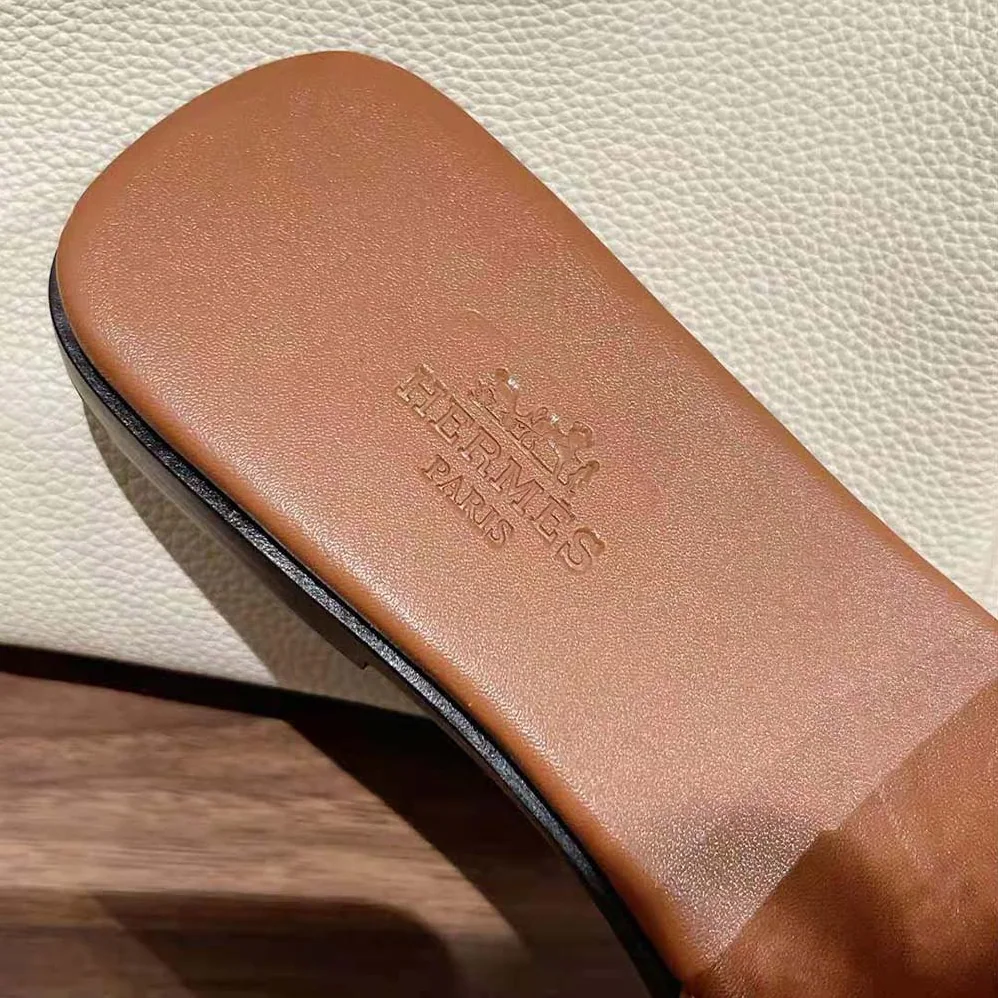 Hermes Giulia Sandal in Calfskin with Iconic Palladium-Plated Kelly Buckle for Women in Brown Hermes Giulia Sandal in Calfskin with Iconic Palladium-Plated Kelly Buckle for Women in Brown