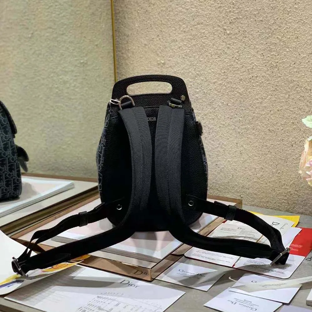 Dior Mini Saddle Backpack Dior Oblique Jacquard for Men in Black Dior Mini Saddle Backpack Dior Oblique Jacquard for Men in Black