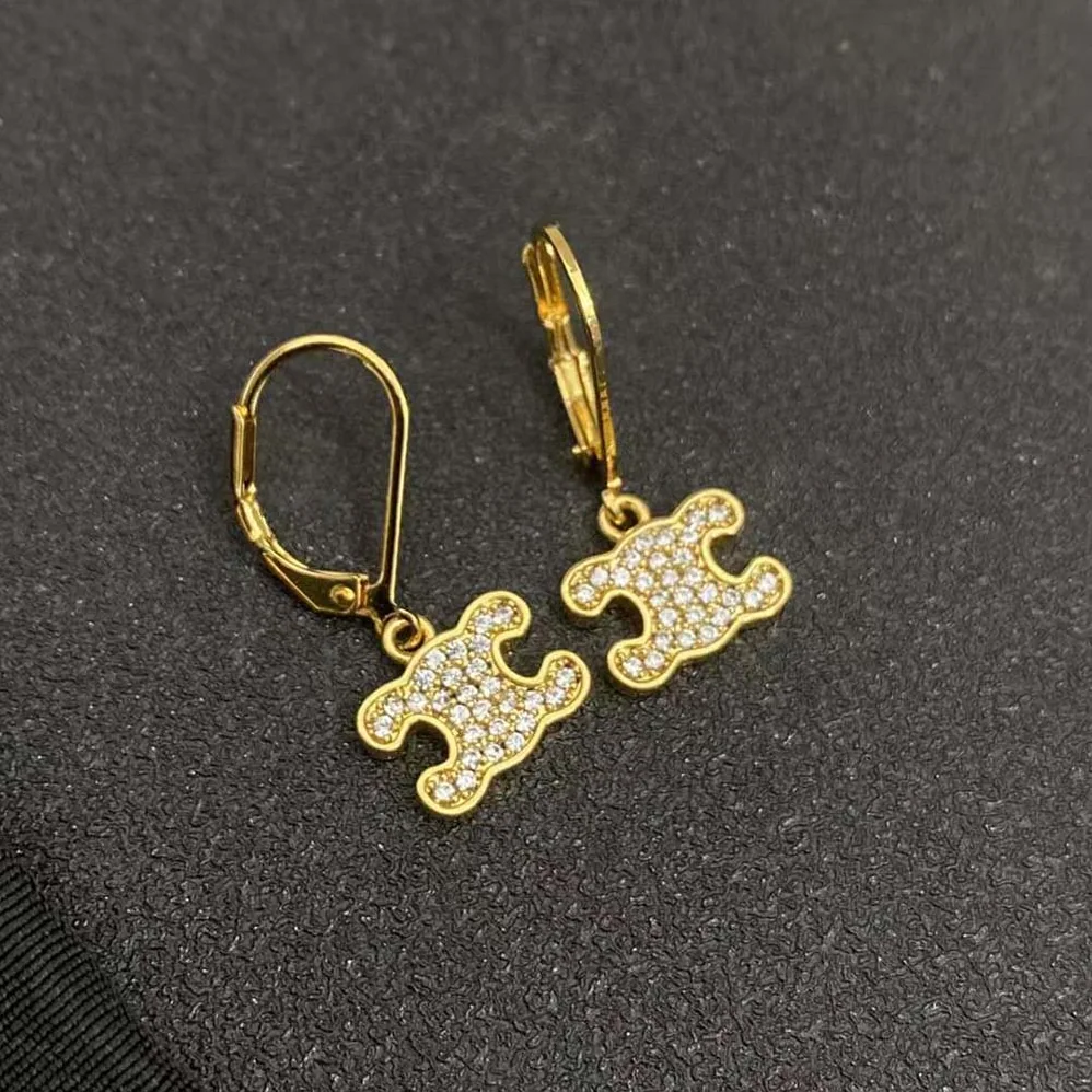 Celine Triomphe Rhinestone Earrings in Brass with Gold Finish and Crystals for Women Celine Triomphe Rhinestone Earrings in Brass with Gold Finish and Crystals for Women