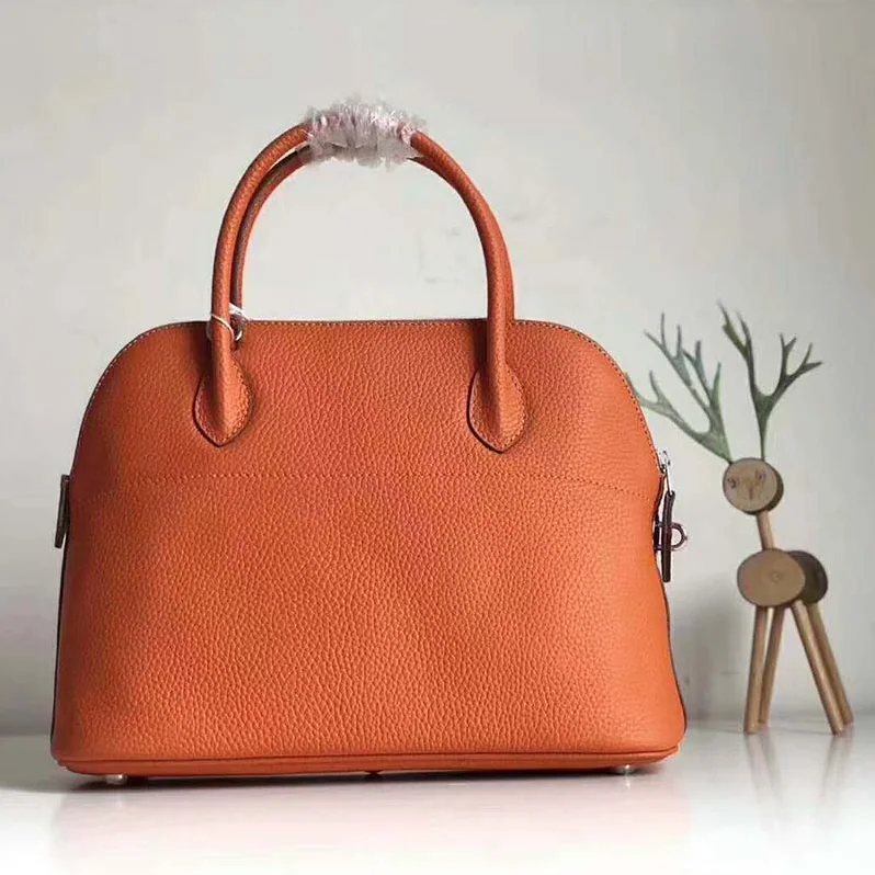 Hermes Bolide 31 bag in Taurillon Clemence Leather for Women in Orange Hermes Bolide 31 bag in Taurillon Clemence Leather for Women in Orange
