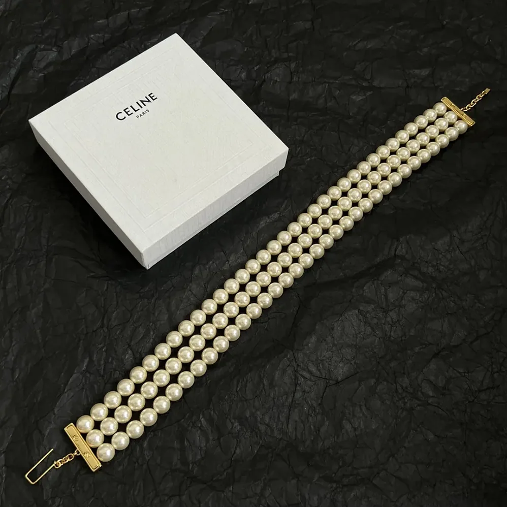 Celine Les Perles Celine Necklace in Resin Pearls Brass with Gold Finish and Steel for Women Celine Les Perles Celine Necklace in Resin Pearls Brass with Gold Finish and Steel for Women