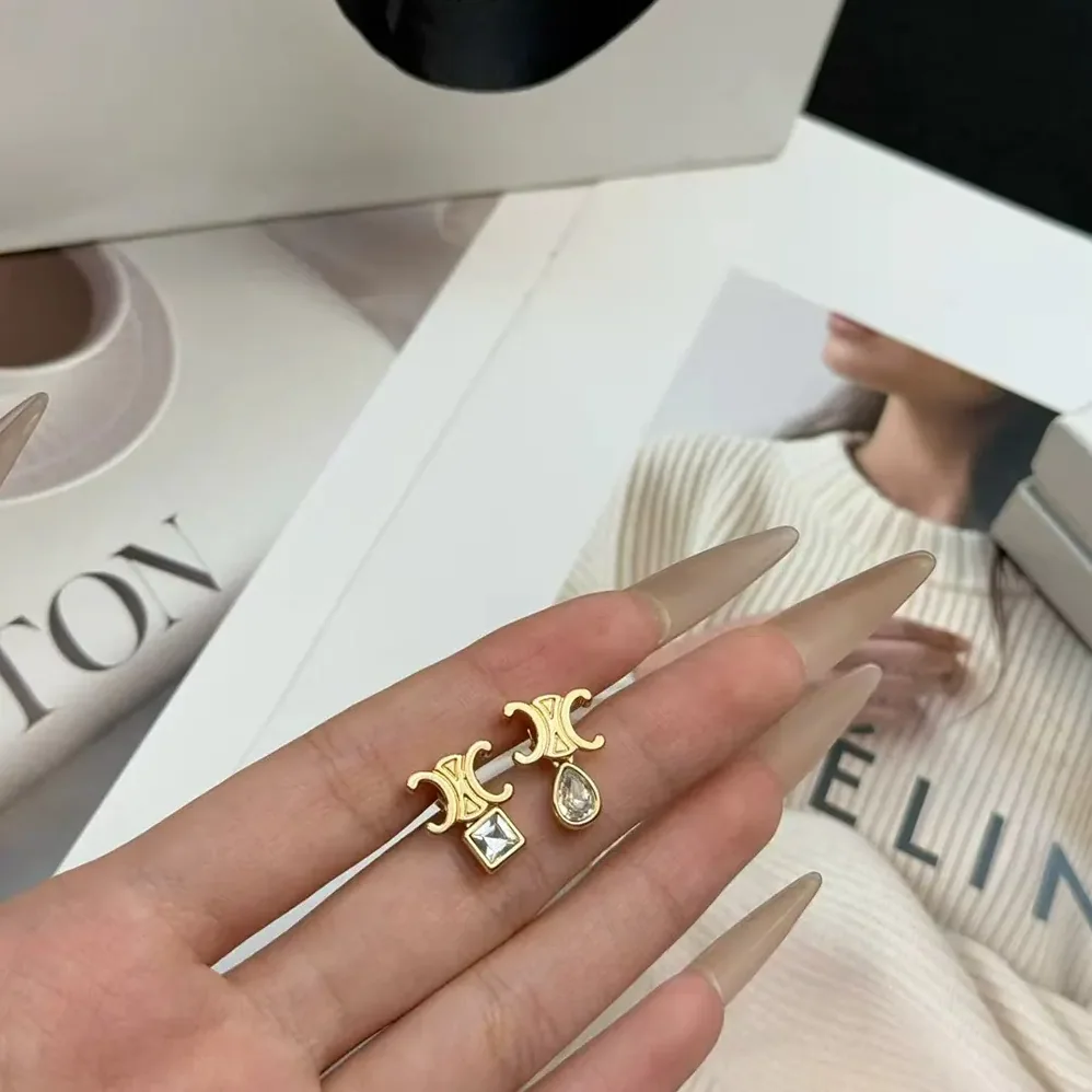 Celine Triomphe Twinkle Earrings in Strass and Brass with Gold Finish for Women