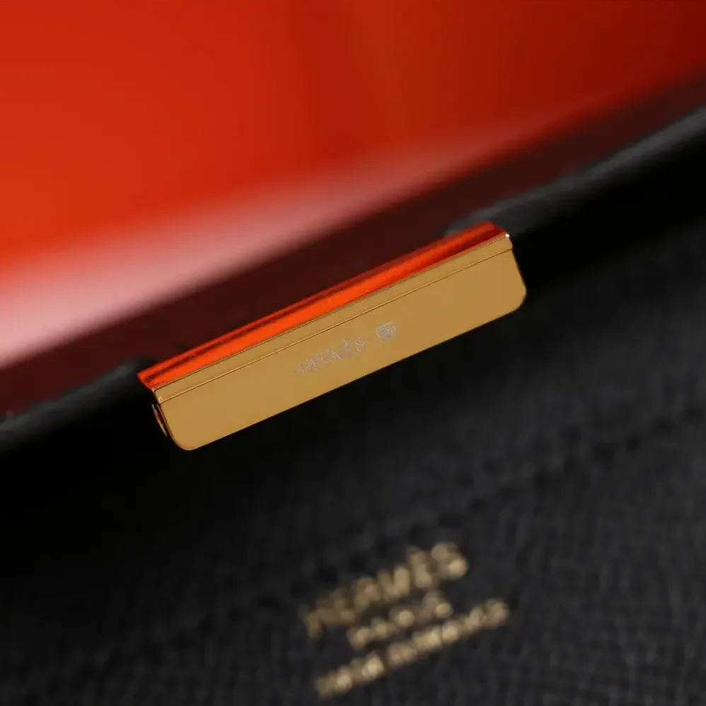 Hermes Constance Long To Go in Epsom Leather for Women in Black/Gold
