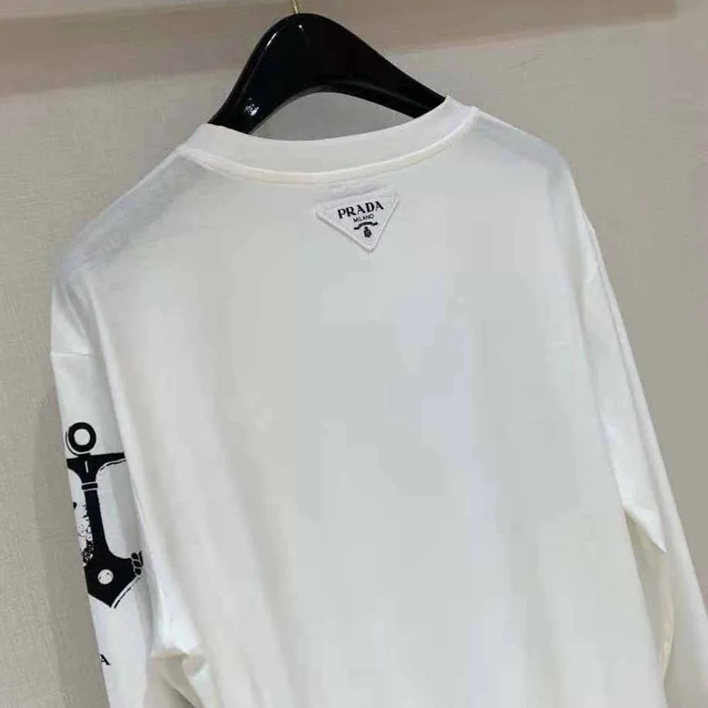 Prada Printed Cotton T-shirt with the Lettering Logo for Women in White Prada Printed Cotton T-shirt with the Lettering Logo for Women in White