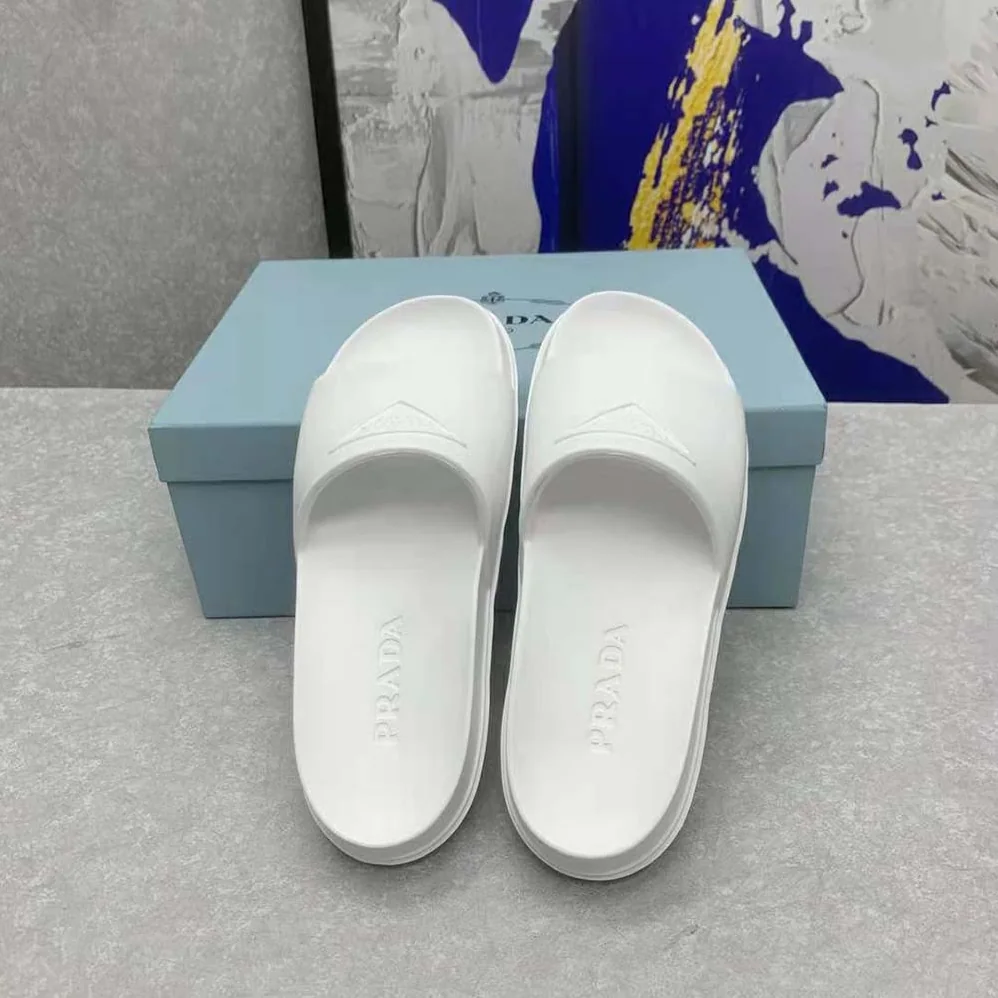 Prada Rubber Slides In 20 mm Heel Height for Women in White Prada Rubber Slides In 20 mm Heel Height for Women in White