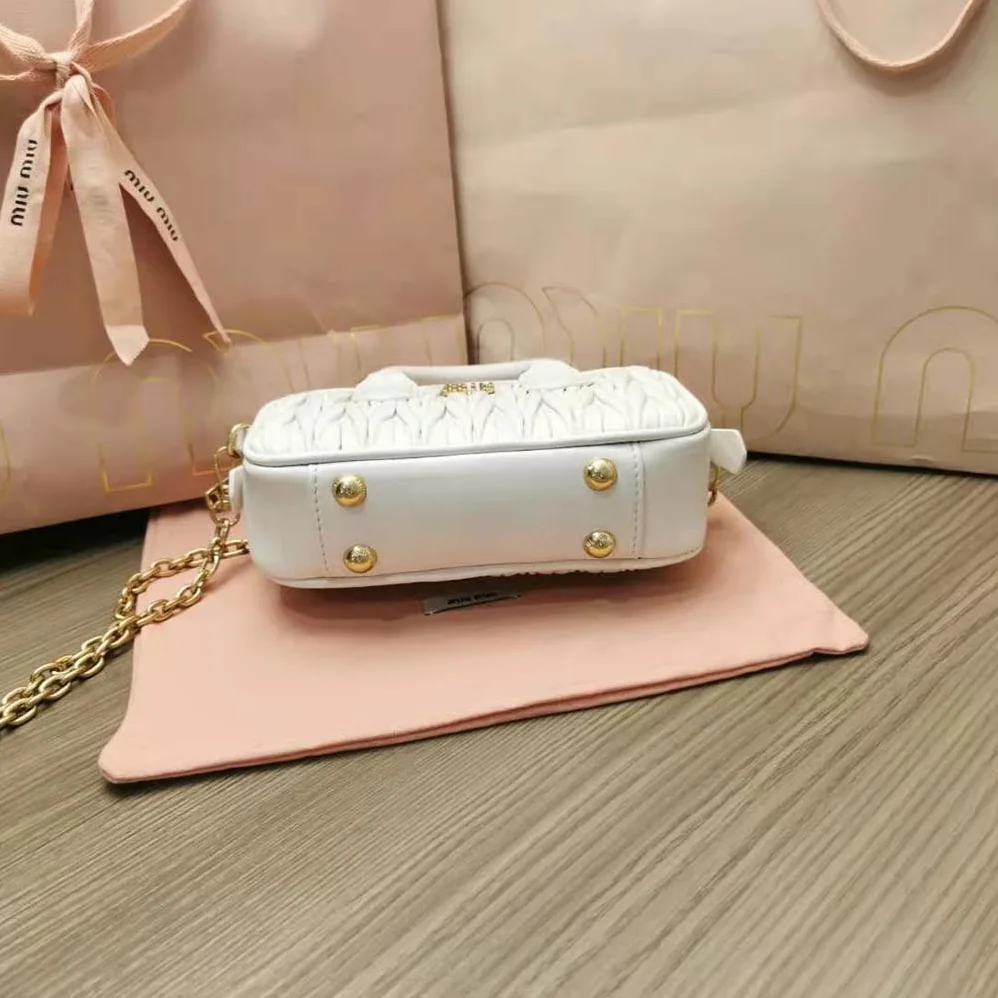Miu Miu Matelassé Nappa Leather Top-Handle Mini-Bag for Women in White Miu Miu Matelassé Nappa Leather Top-Handle Mini-Bag for Women in White