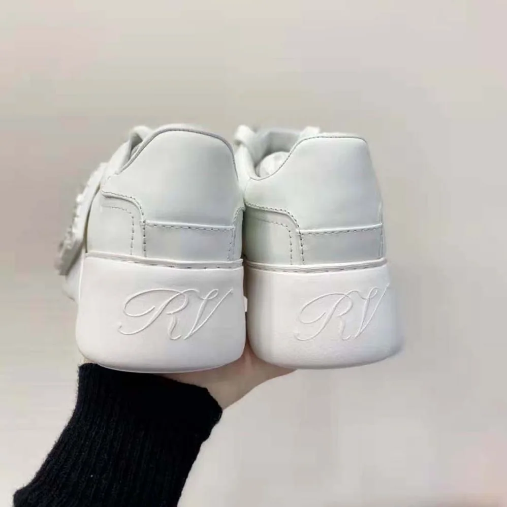 Roger Vivier Viv Skate Strass Buckle Sneakers in Soft Leather for Women in White
