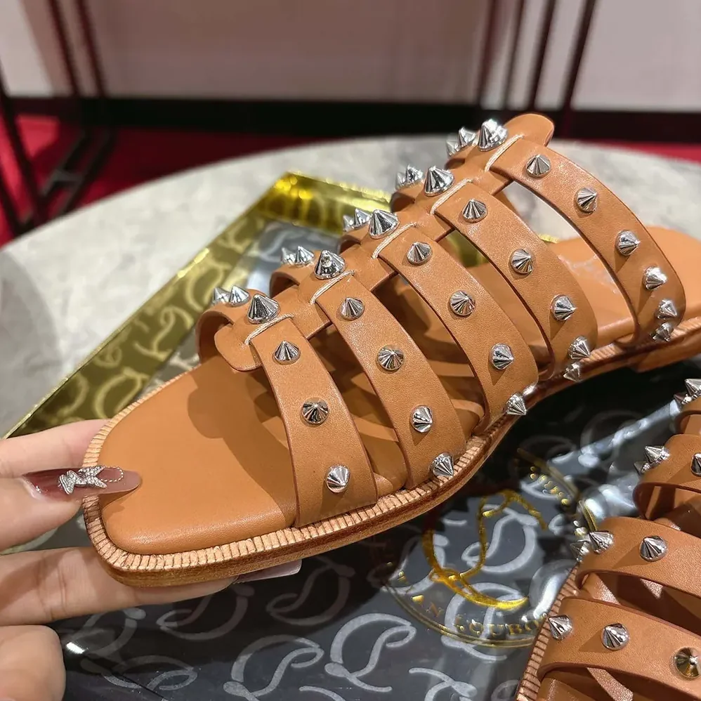 Christian Louboutin Charja Mules Waxed Calf Leather for Women in Brown Christian Louboutin Charja Mules Waxed Calf Leather for Women in Brown