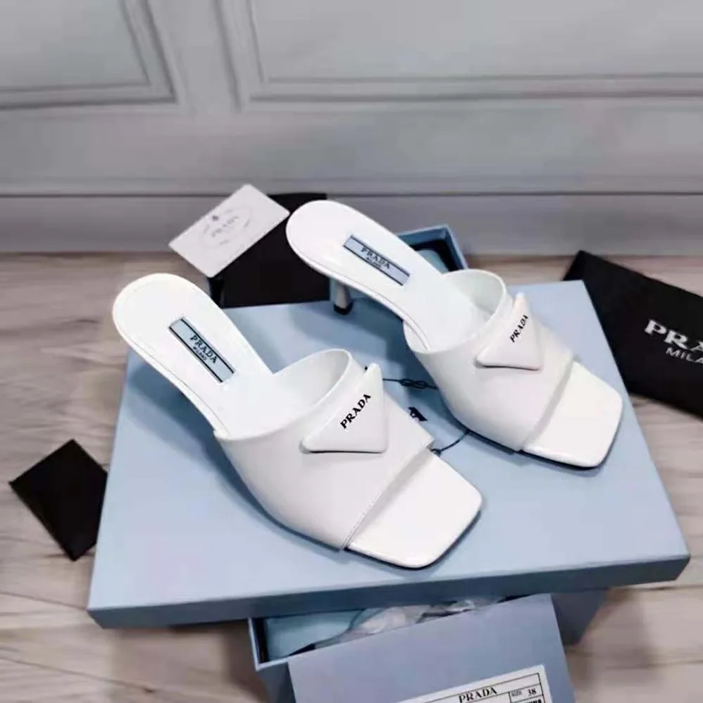 Prada Brushed Leather Mid-heeled Slides in 65mm Heel for Women in White Prada Brushed Leather Mid-heeled Slides in 65mm Heel for Women in White