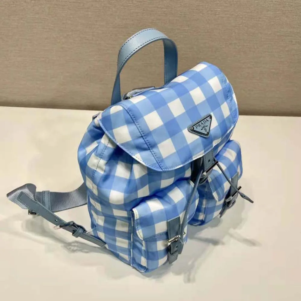 Prada Small Printed Re-Nylon Backpack for Women in Blue Prada Small Printed Re-Nylon Backpack for Women in Blue