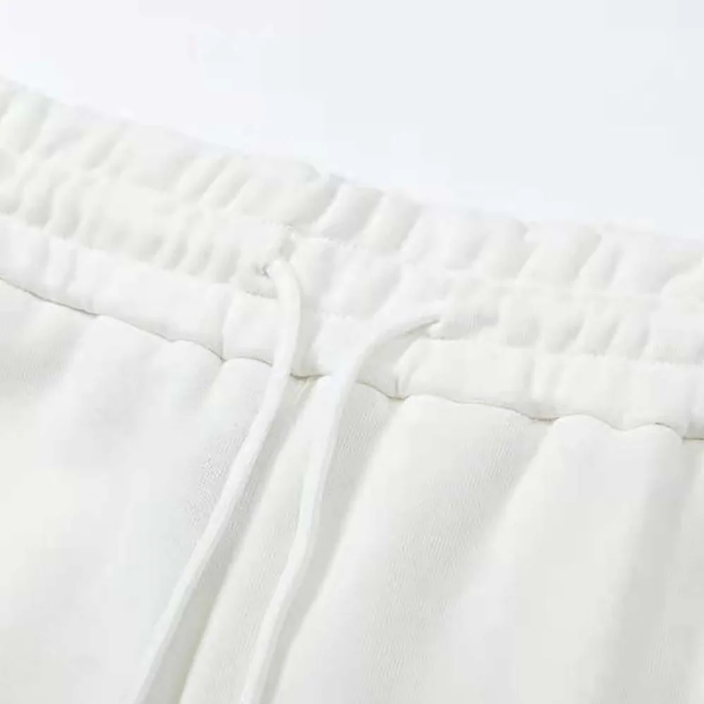 Givenchy Archetype Bermuda Shorts in Fleece for Men in White Givenchy Archetype Bermuda Shorts in Fleece for Men in White