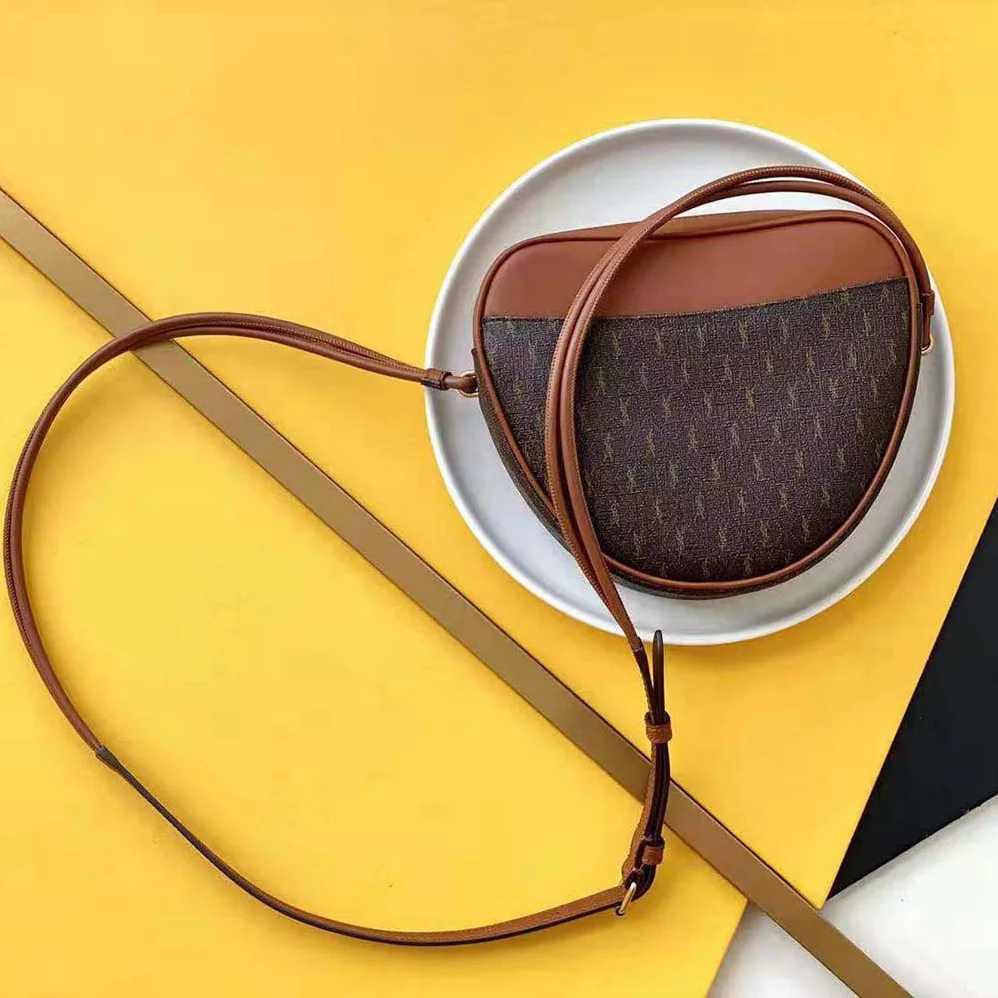 Saint Laurent YSL Le Monogramme Coeur Bag in Canvas and Smooth Leather for Women