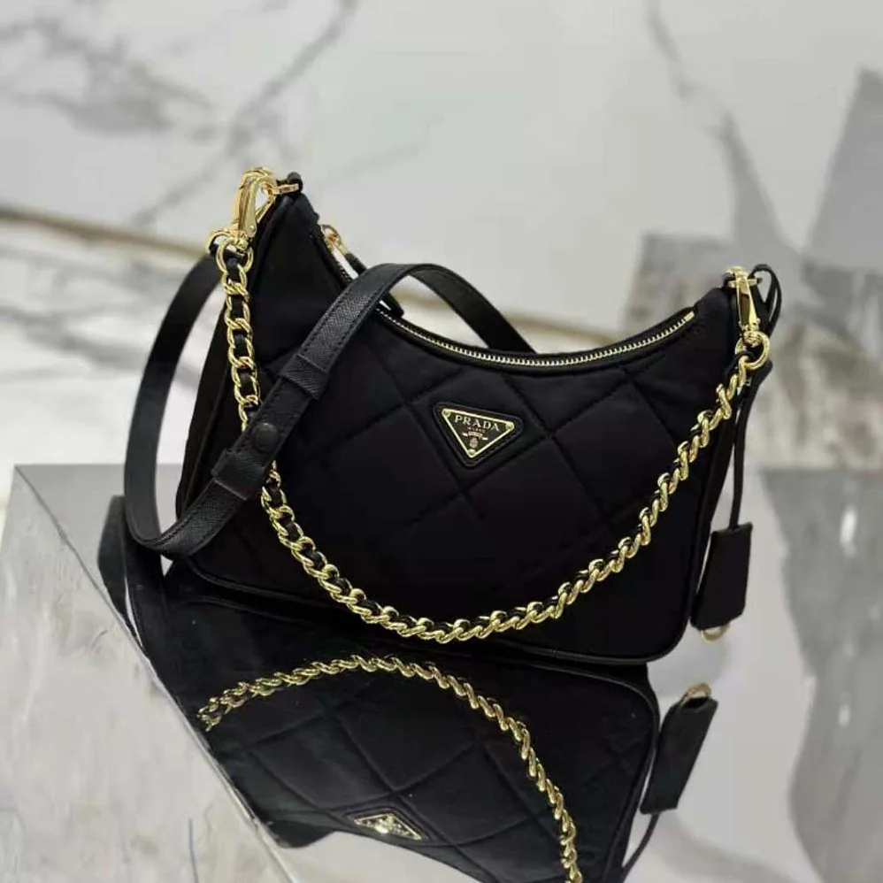 Prada Re-Edition 1995 Chaîne Re-Nylon Mini-bag for Women in Black Prada Re-Edition 1995 Chaîne Re-Nylon Mini-bag for Women in Black