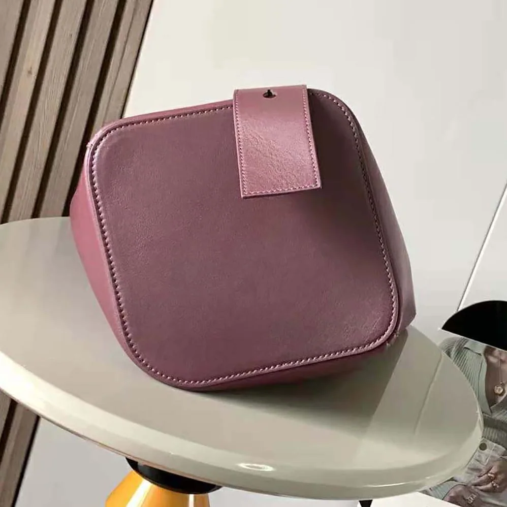 Loewe Mini Pebble Bucket Bag in Mellow Calfskin for Unisex in Maroon