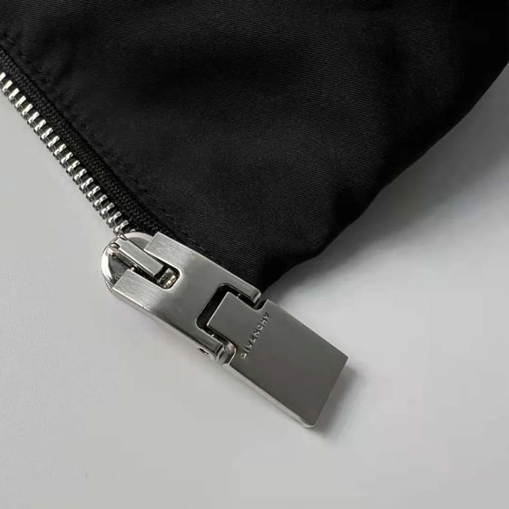 Givenchy Sleeveless Puffer Jacket with Metallic Details for Men Givenchy Sleeveless Puffer Jacket with Metallic Details for Men