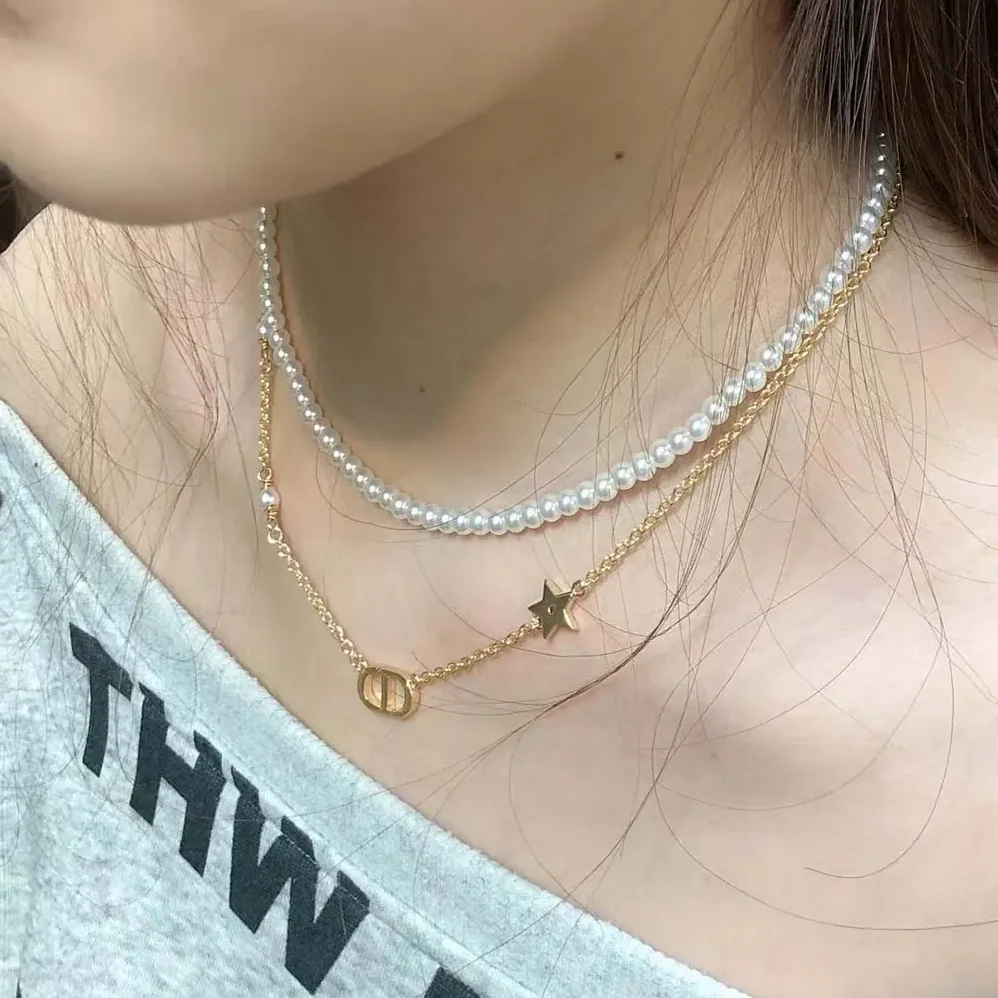 Dior Petit CD Necklace Gold-Finish Metal with White Resin Pearls and Silver for Women in Tone Crystals Dior Petit CD Necklace Gold-Finish Metal with White Resin Pearls and Silver for Women in Tone Crystals
