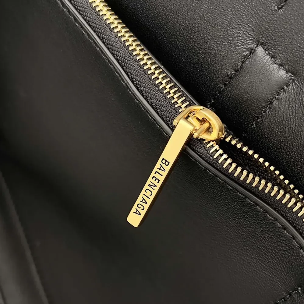 Balenciaga Bel Air Small Carry All Bag in Black Smooth Calfskin for Women in Gold Balenciaga Bel Air Small Carry All Bag in Black Smooth Calfskin for Women in Gold