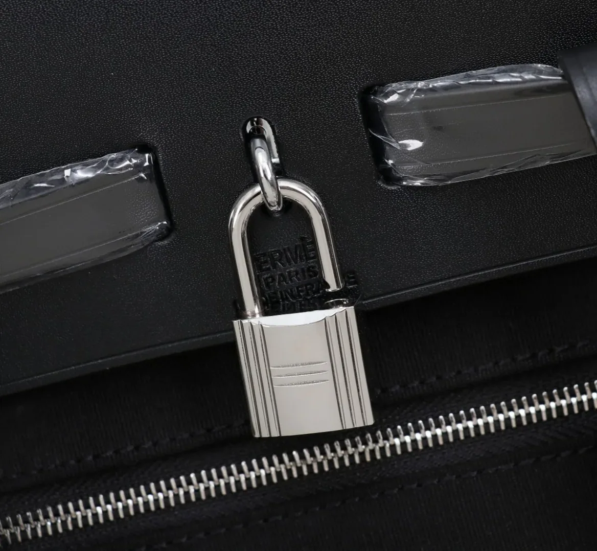 Hermes Buckle Lock Shape Striped Black, Silver Toned Hardware Bag