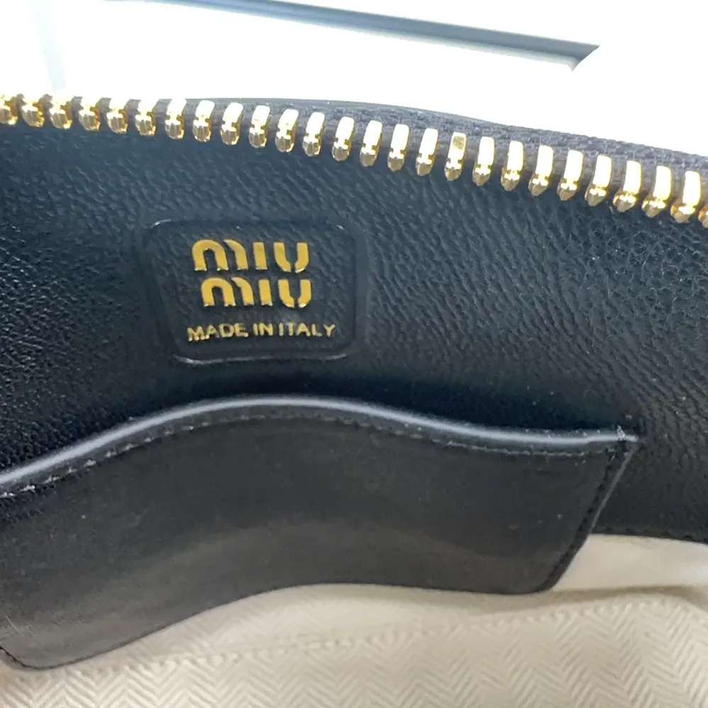 Miu Miu Aventure Nappa Leather Top-handle Bag for Women in Black Miu Miu Aventure Nappa Leather Top-handle Bag for Women in Black