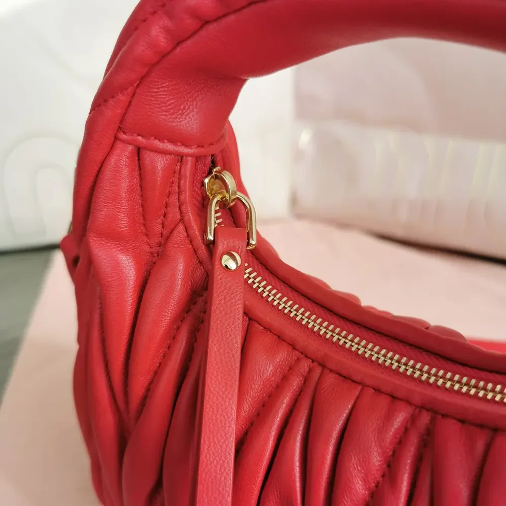 Miu Miu Wander Matelassé Nappa Leather Hobo Mini-Bag for Women in Red Miu Miu Wander Matelassé Nappa Leather Hobo Mini-Bag for Women in Red