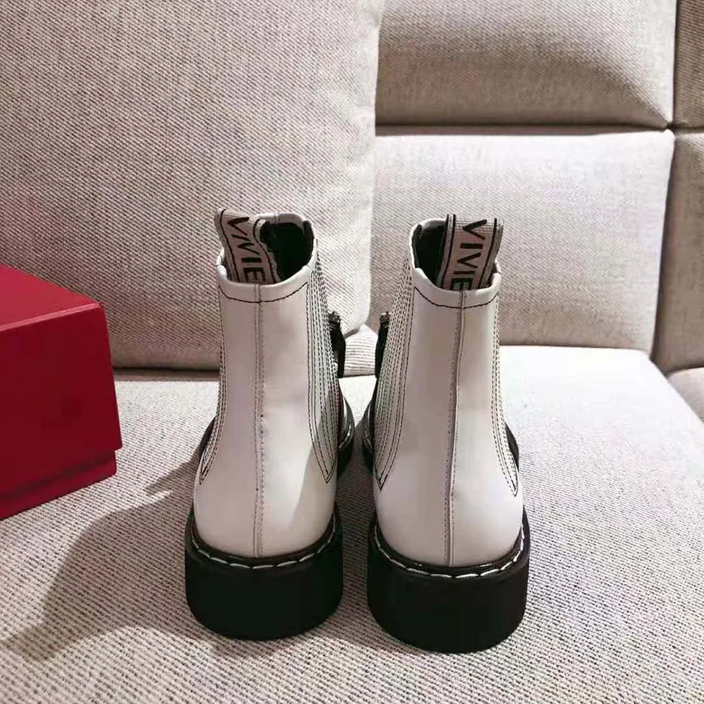 Roger Vivier Viv' Rangers Stitch Strass Buckle Booties in Leather for Women in White Roger Vivier Viv' Rangers Stitch Strass Buckle Booties in Leather for Women in White