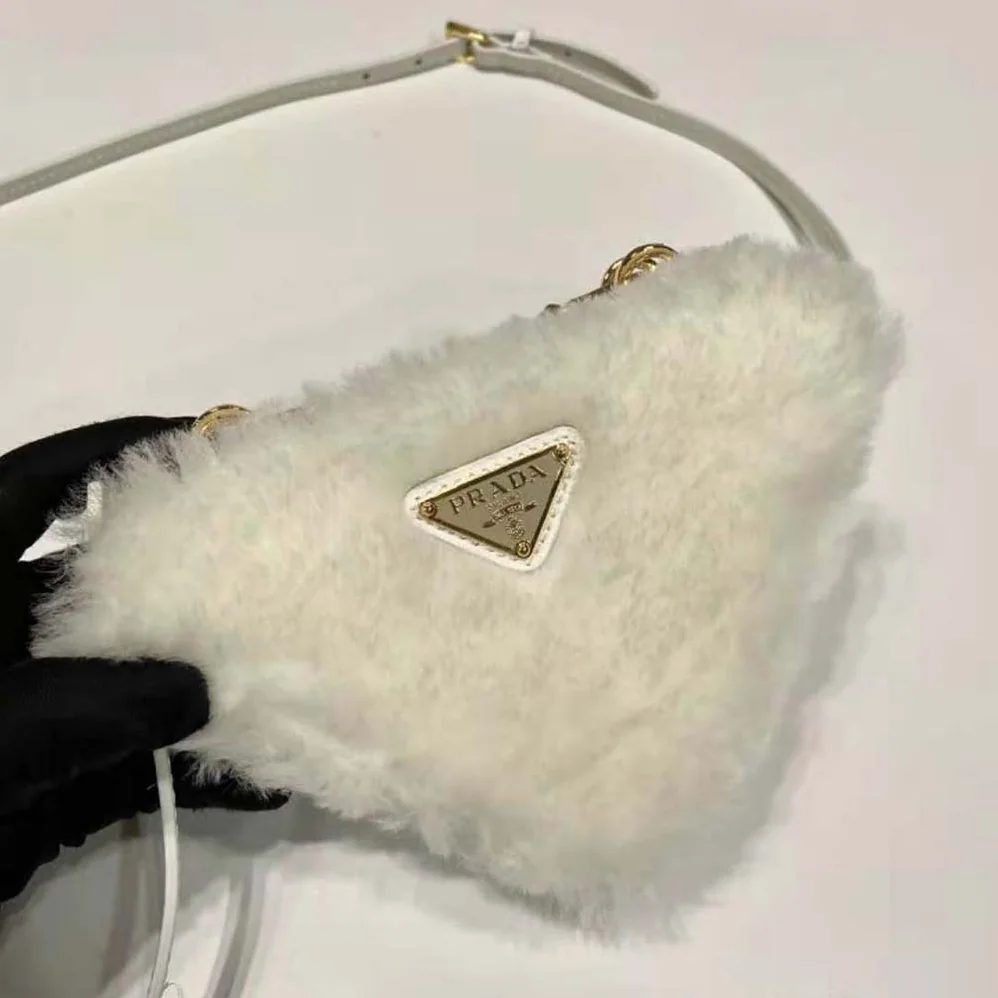 Prada Shearling and Saffiano Leather Mini-Pouch for Women in White