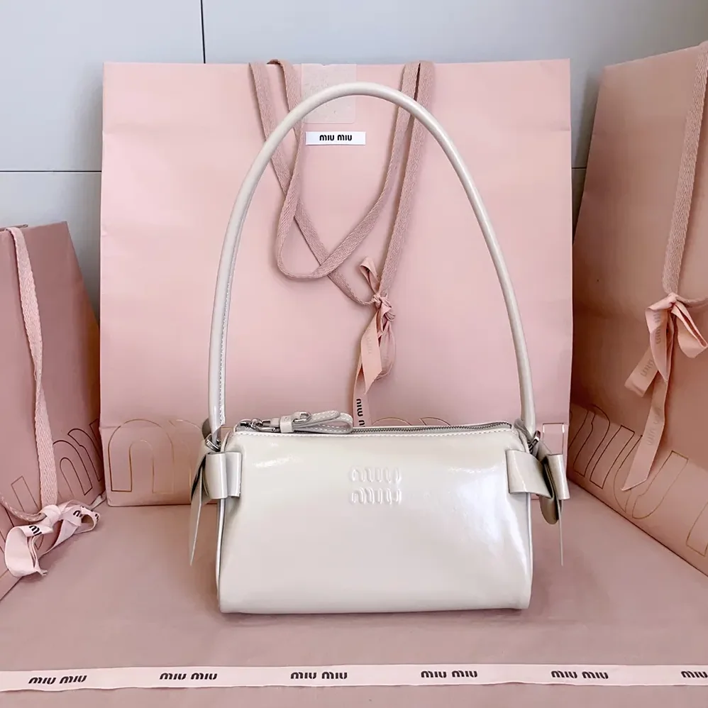 Miu Miu Shiny Leather Pouch for Women in Pink Miu Miu Shiny Leather Pouch for Women in Pink