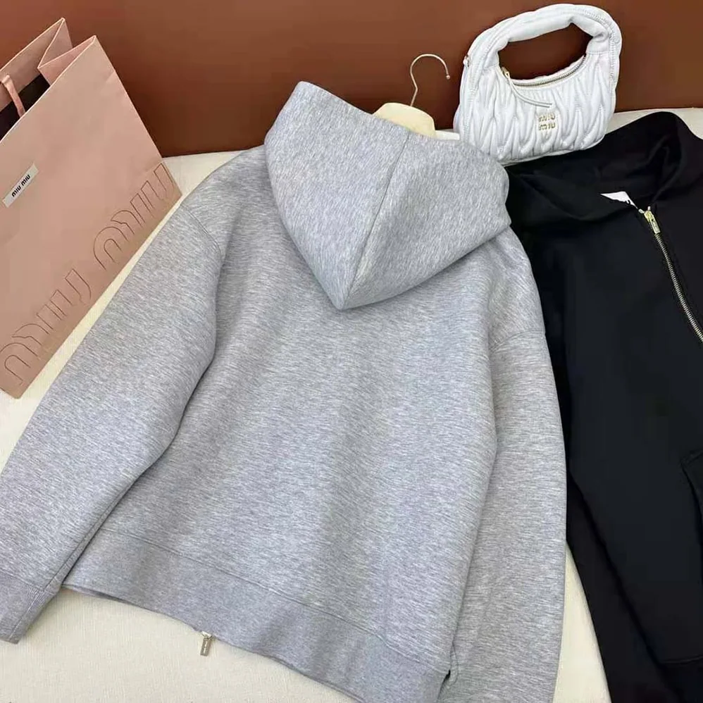 Miu Miu Embroidered Cotton Fleece Hoodie with Embroidered Logo for Women in Silver Miu Miu Embroidered Cotton Fleece Hoodie with Embroidered Logo for Women in Silver