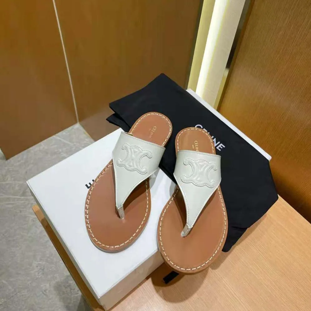 Celine Triomphe Flat Thong in Calfskin for Women in White Celine Triomphe Flat Thong in Calfskin for Women in White