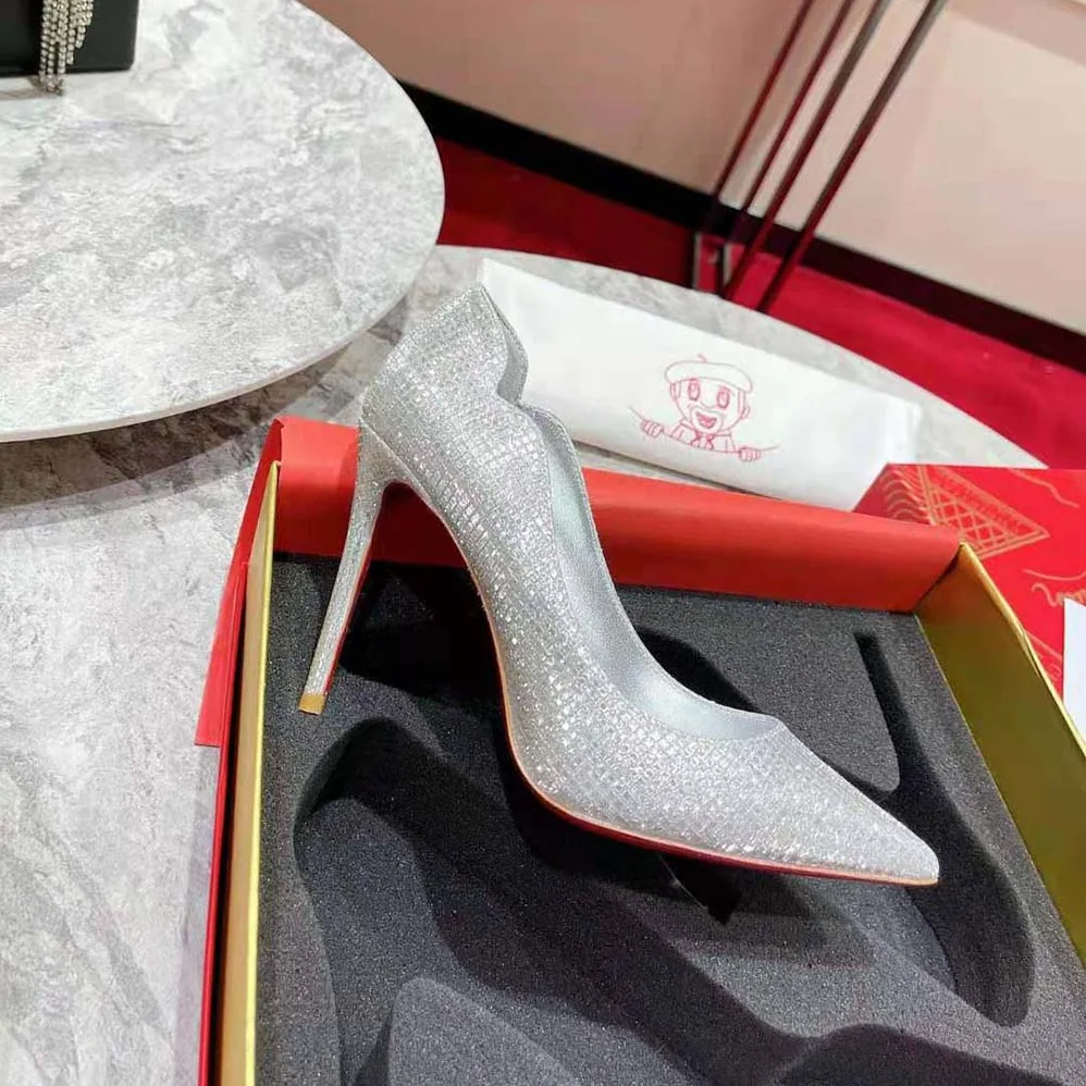 Christian Louboutin Hot Chick 100 mm Heel Height for Women in Silver Christian Louboutin Hot Chick 100 mm Heel Height for Women in Silver