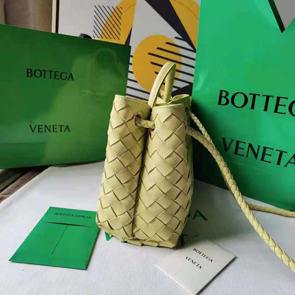 Bottega Veneta Small Andiamo Intrecciato Leather Top Handle Bag for Women in Yellow