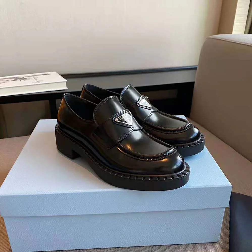 Prada Brushed Leather Loafers for Women in Black