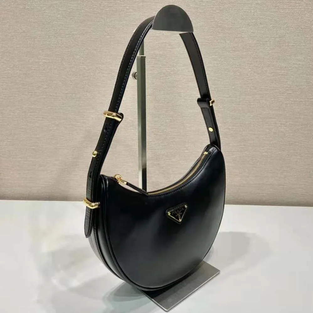Prada Leather Shoulder Bag with Enameled Metal Triangle Logo for Women in Black