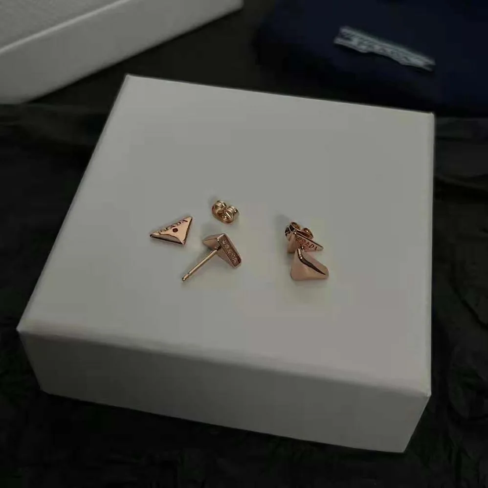 Prada Eternal Gold Nano Triangle Mono Earring in Pink Gold for Women Prada Eternal Gold Nano Triangle Mono Earring in Pink Gold for Women