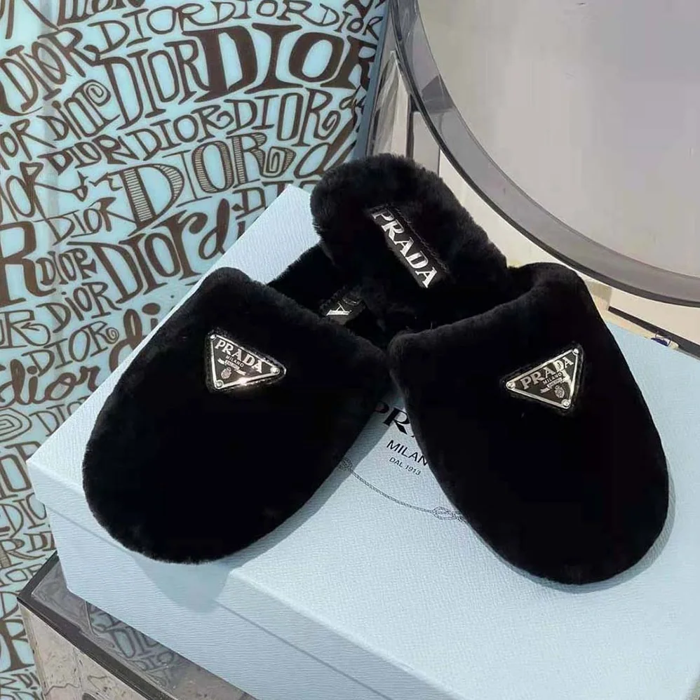 Prada Enameled Triangle Logo Accentuates Shearling Sabots for Women