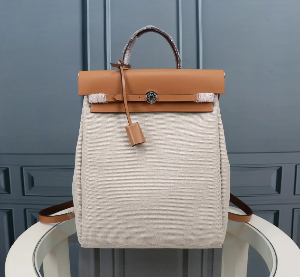 Hermes Buckle Lock Shape Striped Beige, Silver Toned Hardware Bag