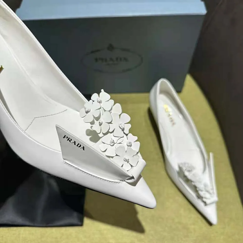 Prada Brushed Leather Pumps with Floral Appliqués for Women in White