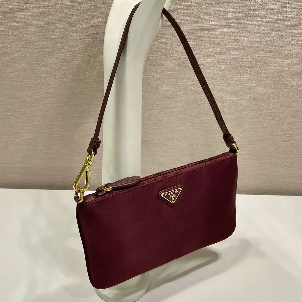 Prada Re-Nylon Pouch Enameled Metal Triangle Logo for Women Prada Re-Nylon Pouch Enameled Metal Triangle Logo for Women